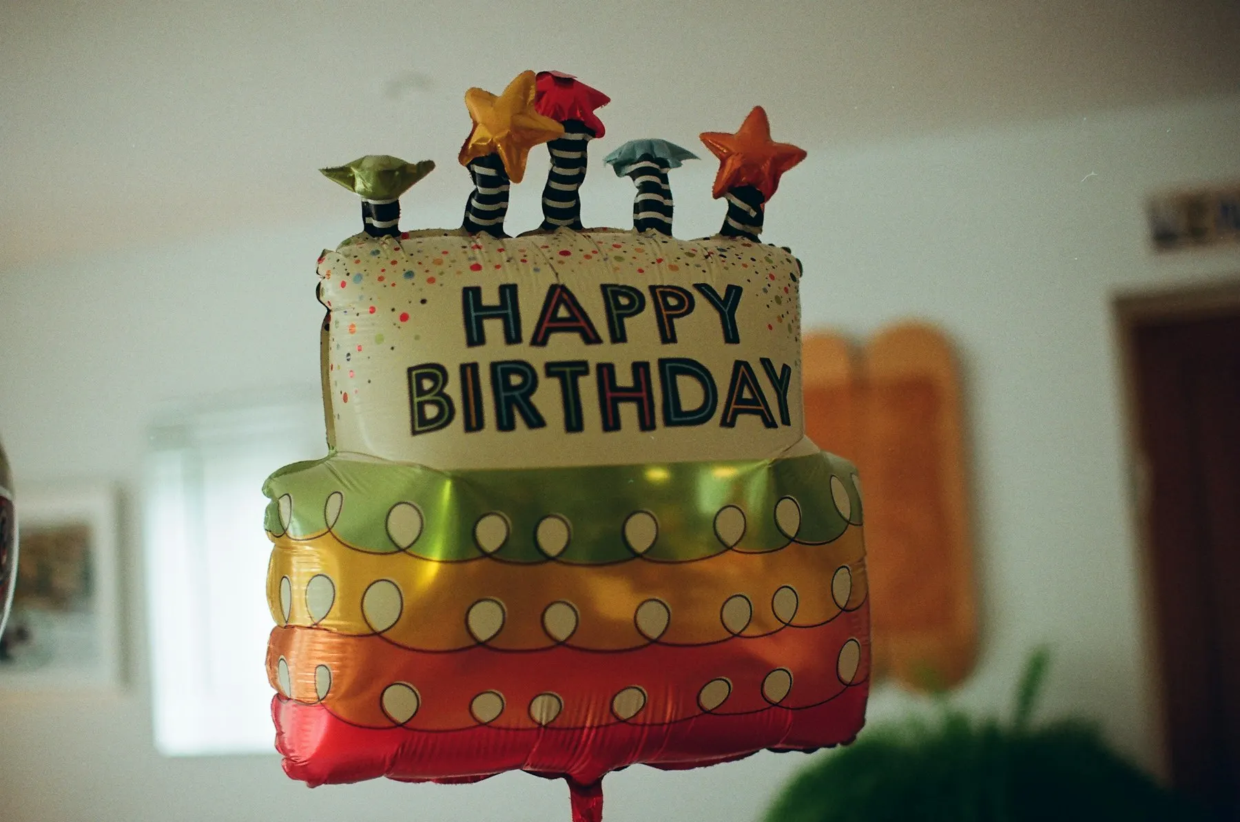Birthday cake foil balloon with stars