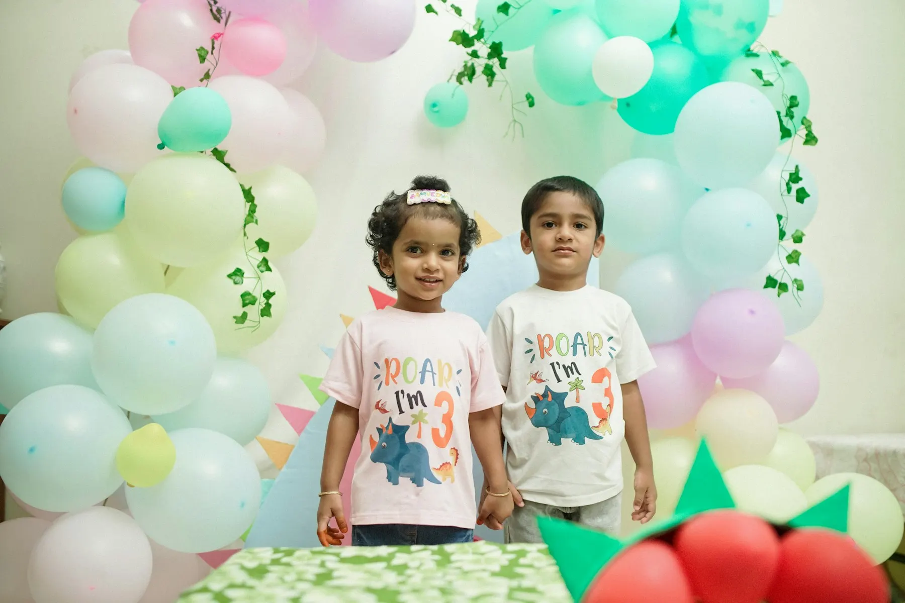 Pastel balloon arch at a kids birthday party