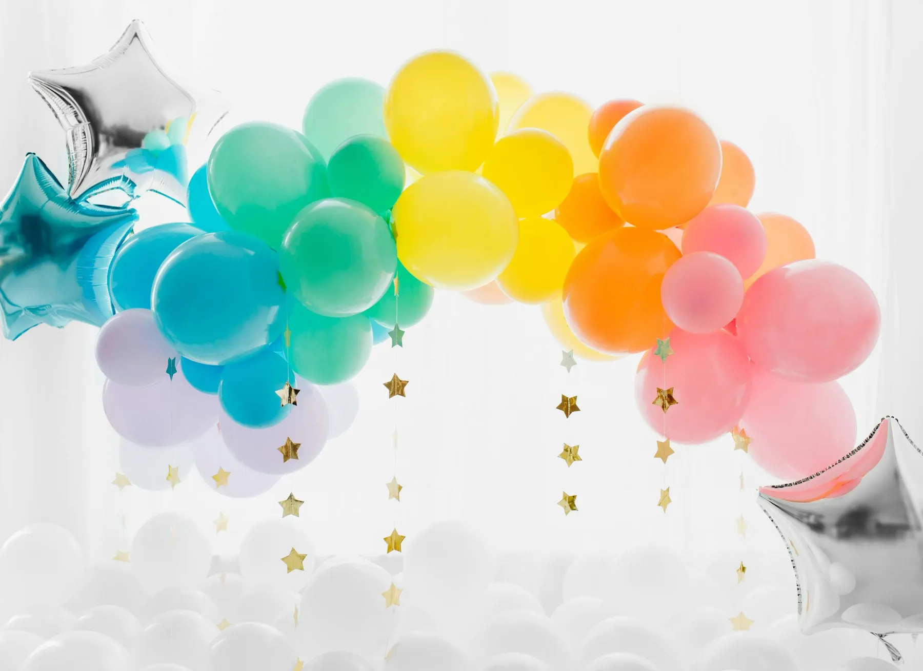 Blue and yellow balloons with cloud cut-outs
